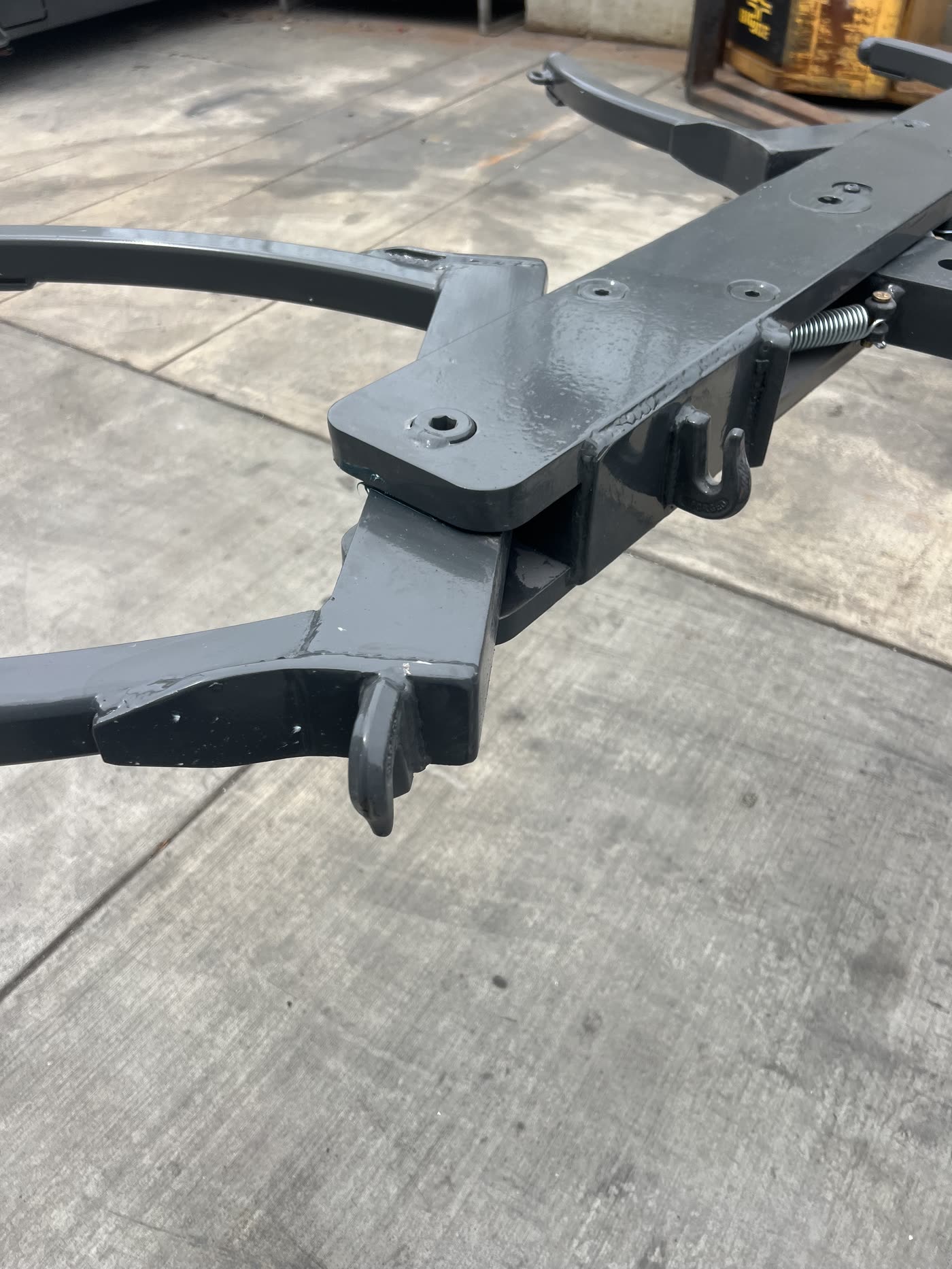 Close-up of an Auto-Hook claw and its pivot