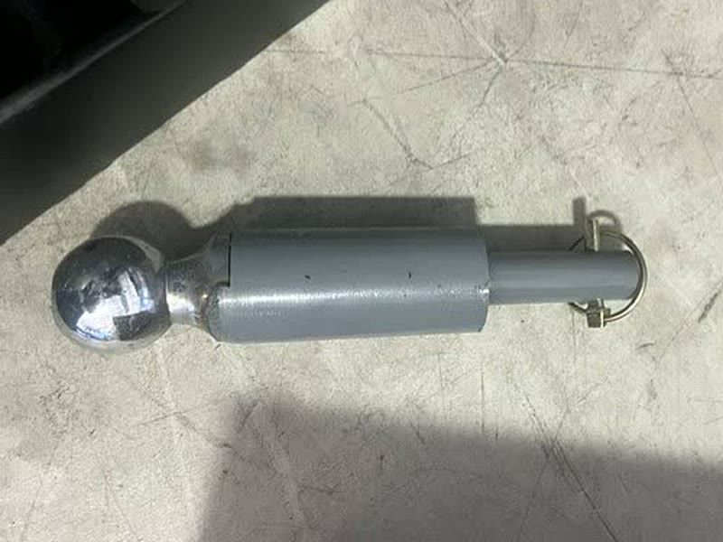 Autowlift drop-in ball hitch attachment with retaining pin