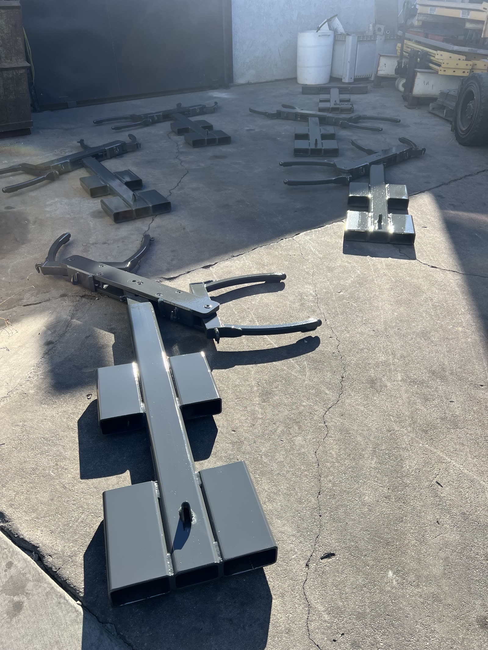 Finished Autowlift attachments staged outside the Hawthorne shop